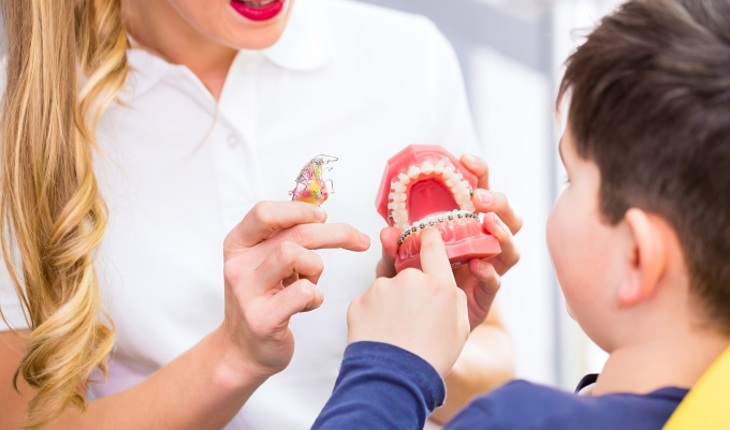 Как ухаживать за зубами детей с особенностями развития? - фото