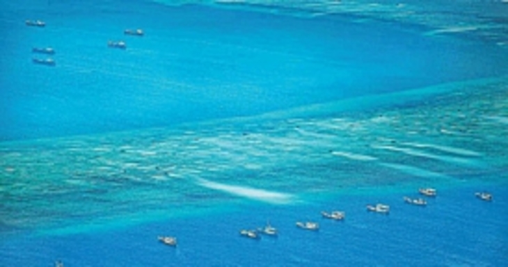 Китай и Филиппины устроили сражение за риф Айюнгин - фото