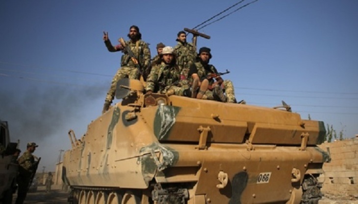 Сирийская армия продолжает марш по курдским территориям - фото