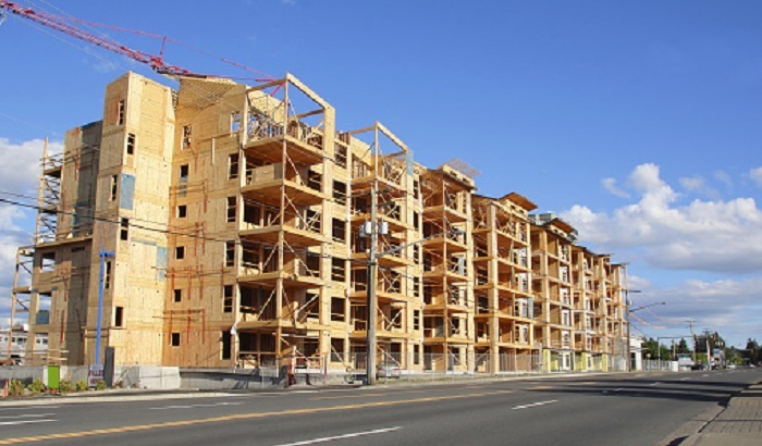 В России к 2030 году 7% многоквартирных домов будут деревянными - фото
