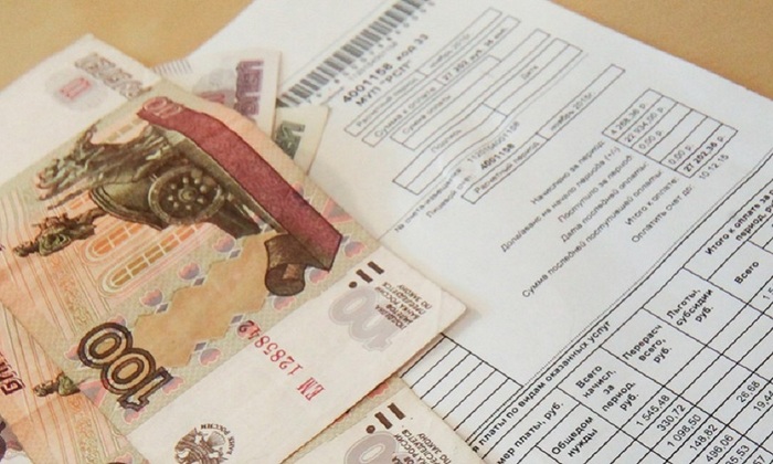 Россиян предупредили о новой схеме мошенничества с фальшивыми квитанциями ЖКУ - фото
