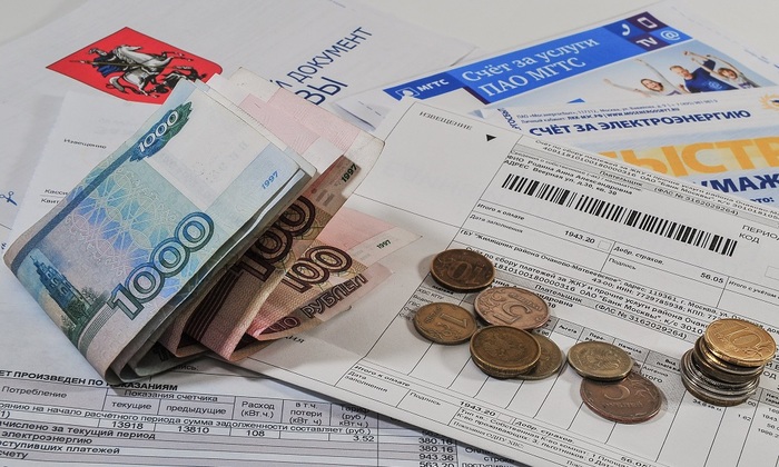 Долги по оплате ЖКУ заставят платить не суды, а нотариусы - фото